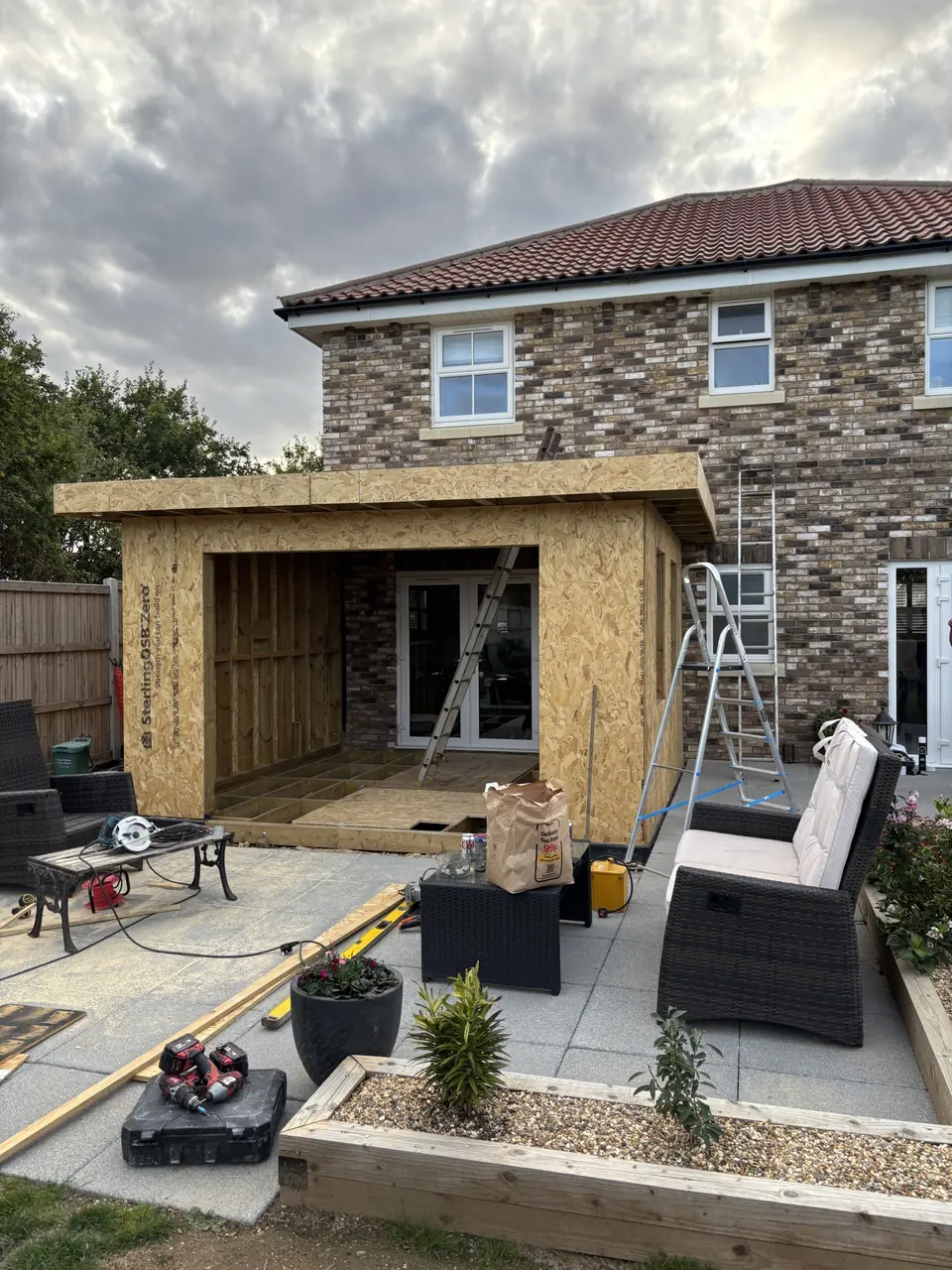 Front of the timber extension as roof and wall sheathing are fitted
